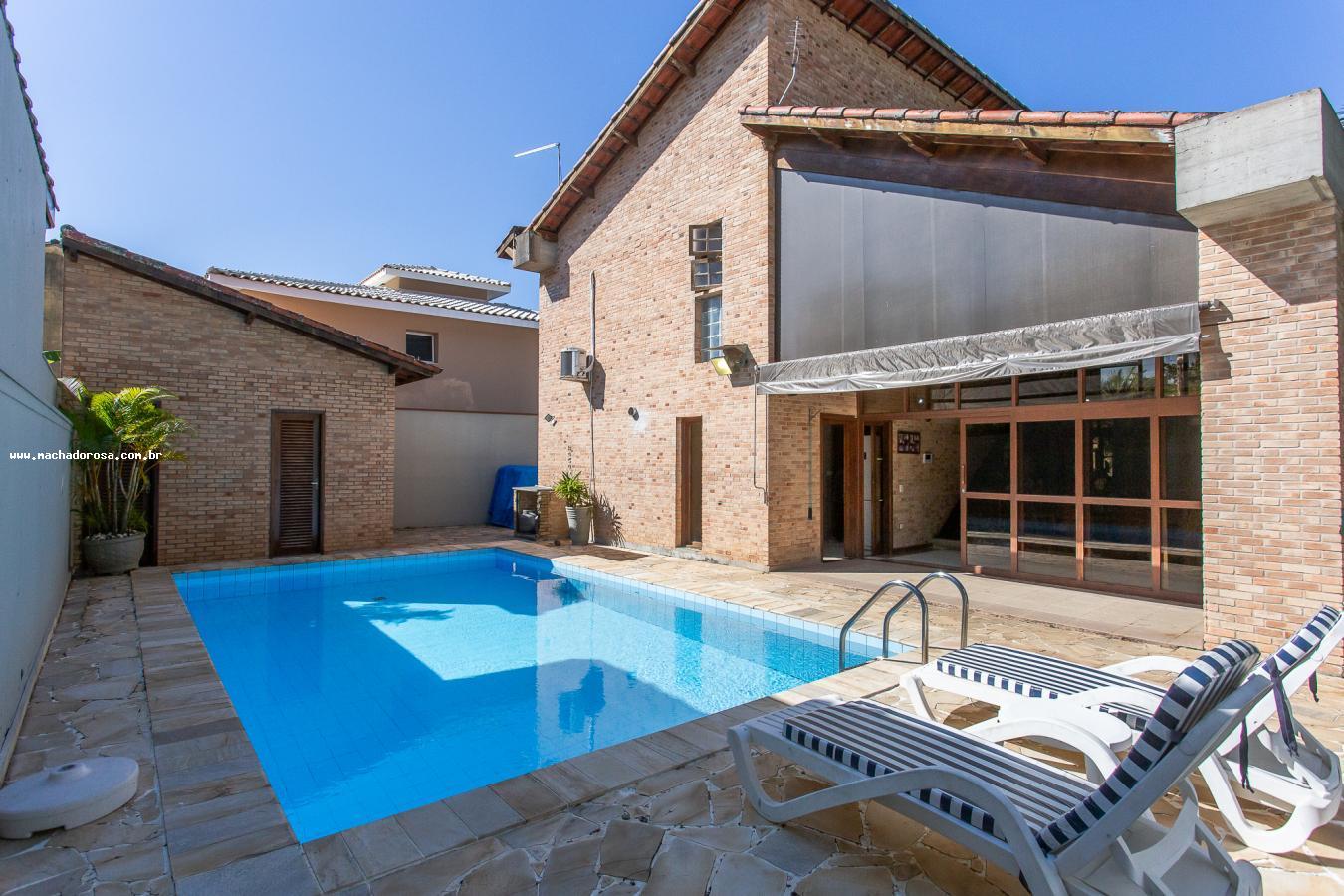 Casa à venda com 3 quartos, 229m² - Foto 1